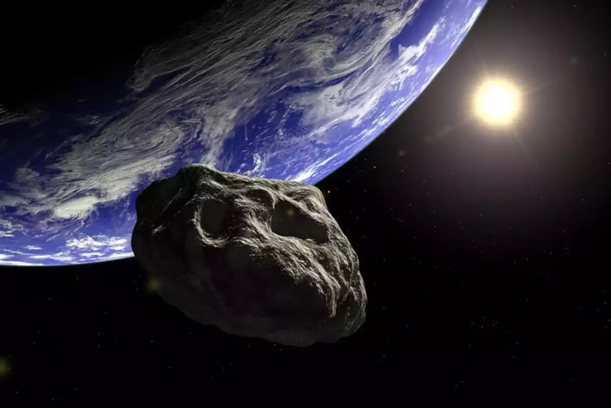 Imagen ilustrativa de un asteroide acercándose a la Tierra