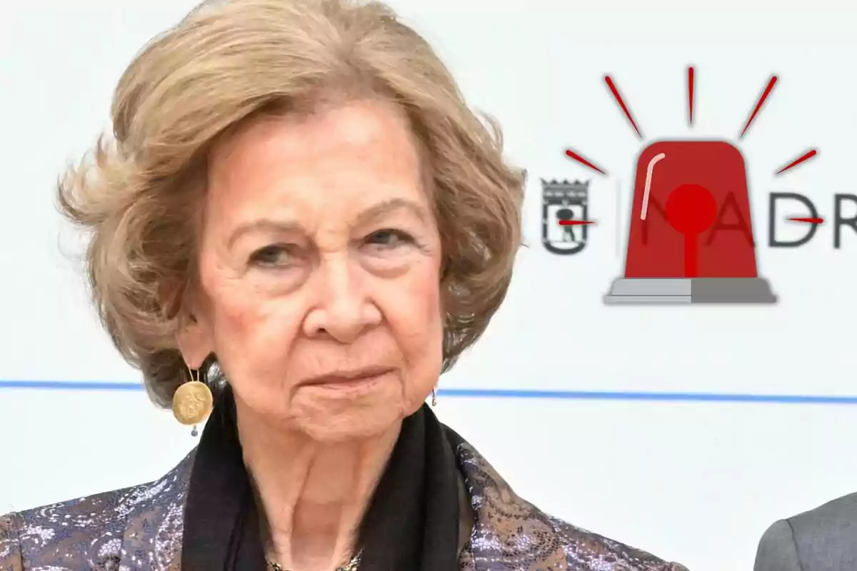 Queen Sofía is wearing a golden earring and is in front of a white background with a red mermaid graphic. Queen Sofía is wearing a golden earring and is in front of a white background with a red mermaid graphic.